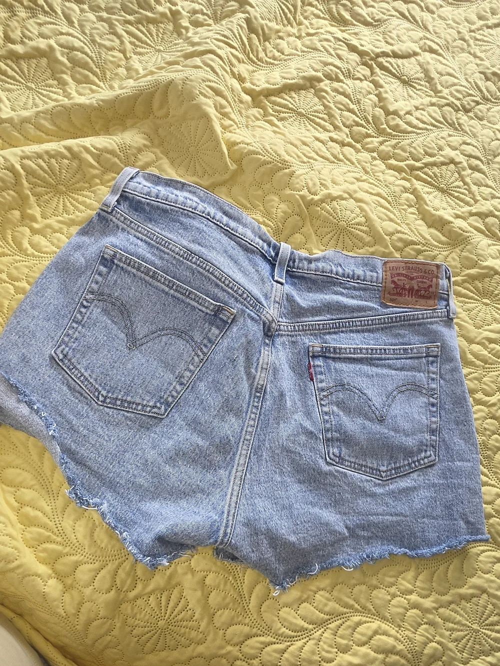 Levi's 501 Light Blue Distressed Denim Shorts